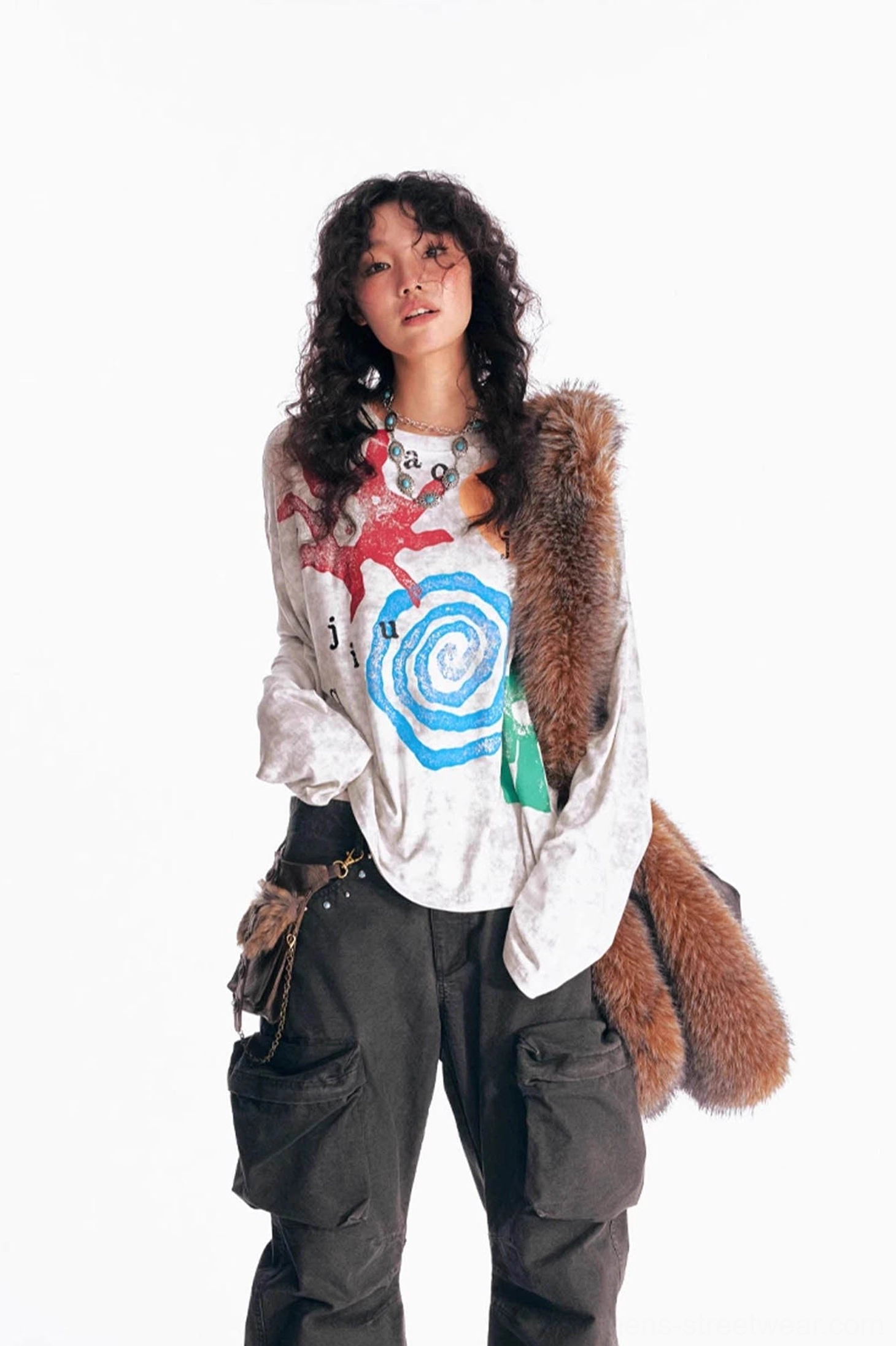 Multicolor abstract tribal print washed long sleeve tee in an oversized Korean streetwear outfit with black cargo pants