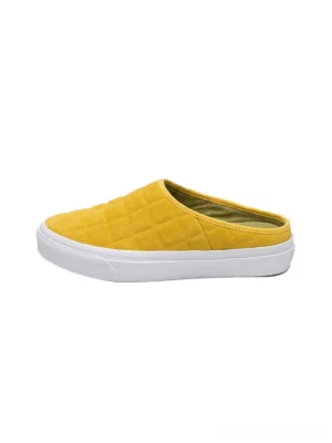 Mustard yellow quilted backless streetwear sneaker mule side view with white rubber outsole