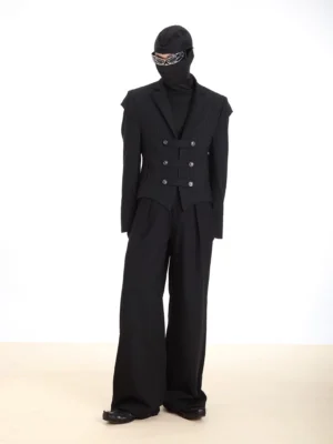 Mystic black pinstripe cropped tailored blazer and wide-leg trousers shown in a dark avant-garde mens streetwear look