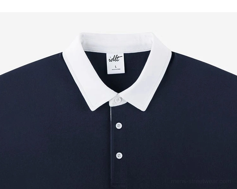 Navy blue knit polo shirt close-up with crisp white contrast collar and two-button front placket