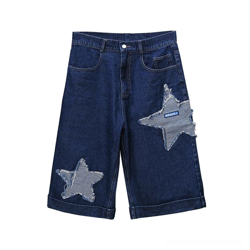 Navy blue dark indigo star patch denim culottes product image showing the wide-leg cropped silhouette and statement streetwear design
