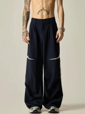Navy blue wide-leg track pants with double white side stripes, pleated waist, and relaxed baggy Korean streetwear fit