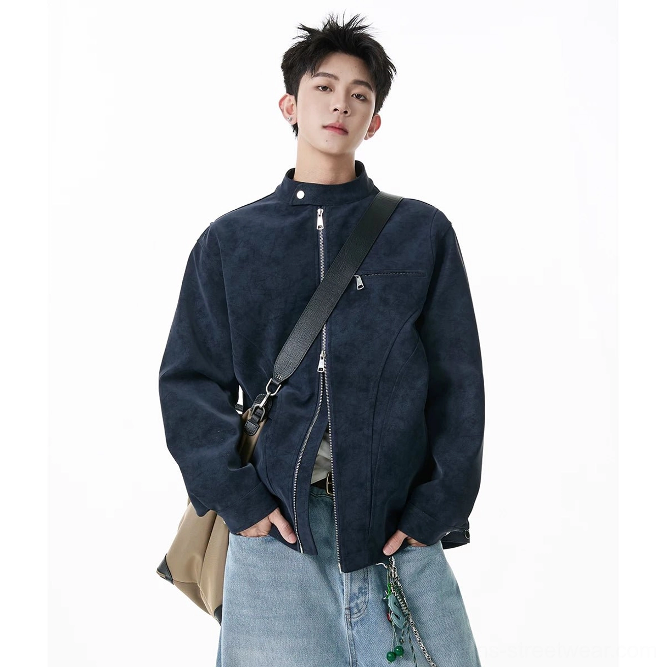 Navy blue faux suede moto zip jacket with stand collar styled with denim jeans crossbody bag and wallet chain
