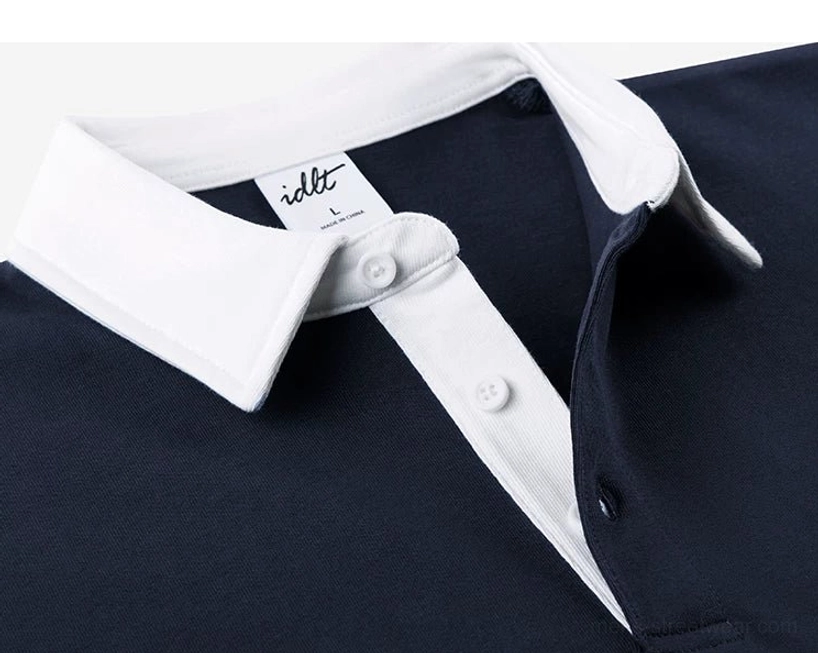 Navy blue contrast collar polo shirt showing functional buttons neat collar edges and detailed knit placket