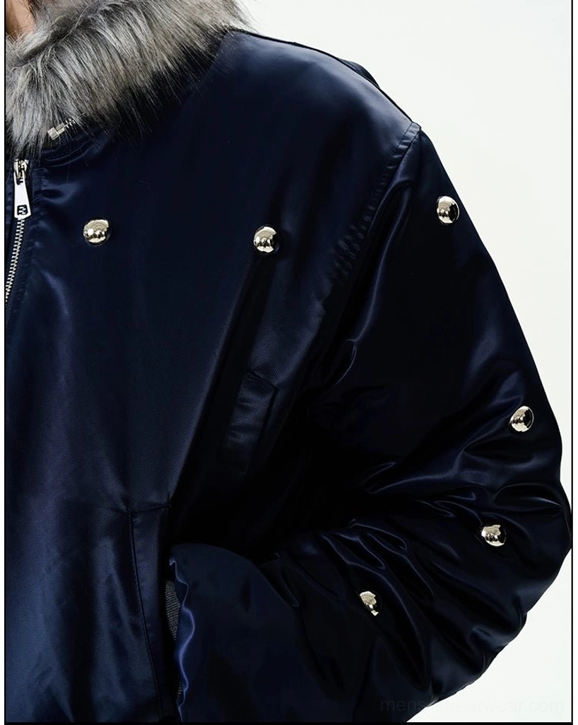 Navy blue satin bomber jacket with faux fur collar metallic studs and cropped streetwear silhouette