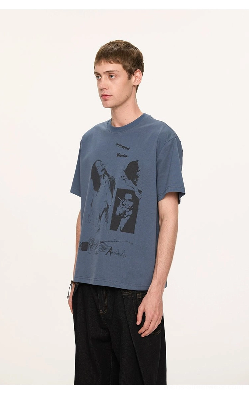 Close-up navy blue UPF 50+ crewneck T-shirt showing monochrome portrait collage and artistic handwritten graphic details