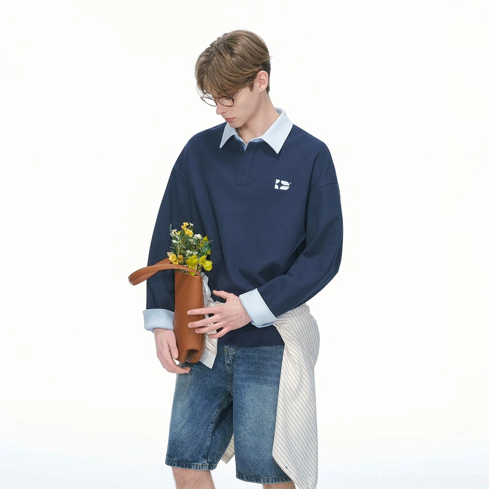 Navy blue varsity collar rugby sweatshirt colorway with quarter-button placket contrast cuffs relaxed fit and chest embroidery