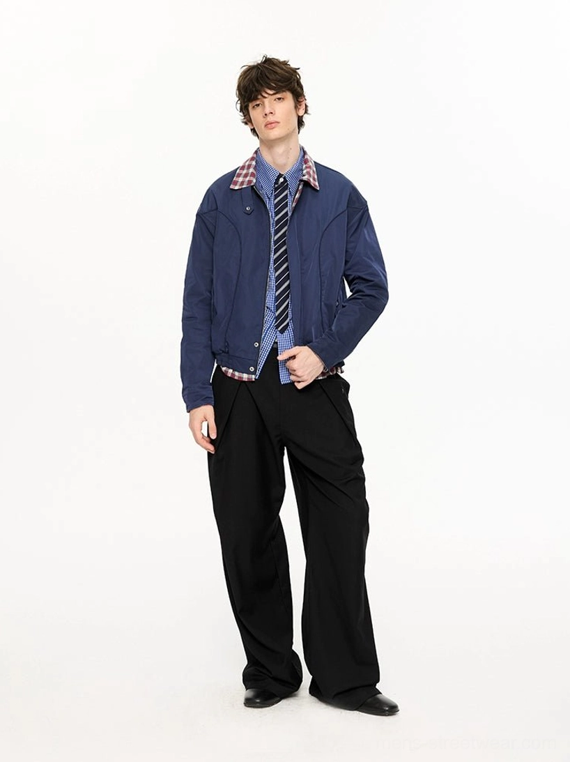 Navy cropped Harrington jacket side front view showing structured shoulder panels flap snap pockets and relaxed blouson fit