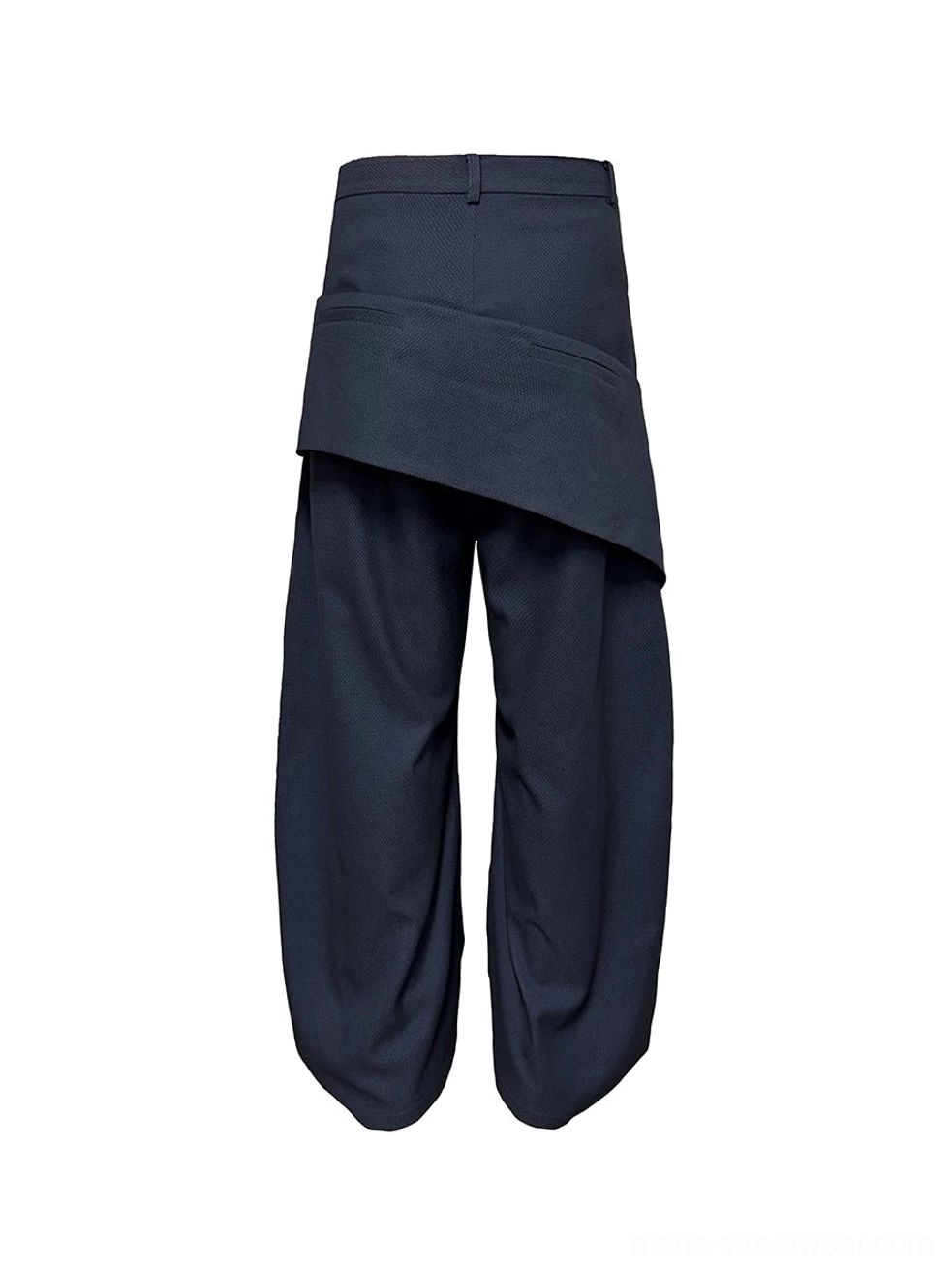 Front flat lay of navy wide-leg trousers showing belt loops, oversized asymmetric pouch, and diagonal metal zipper