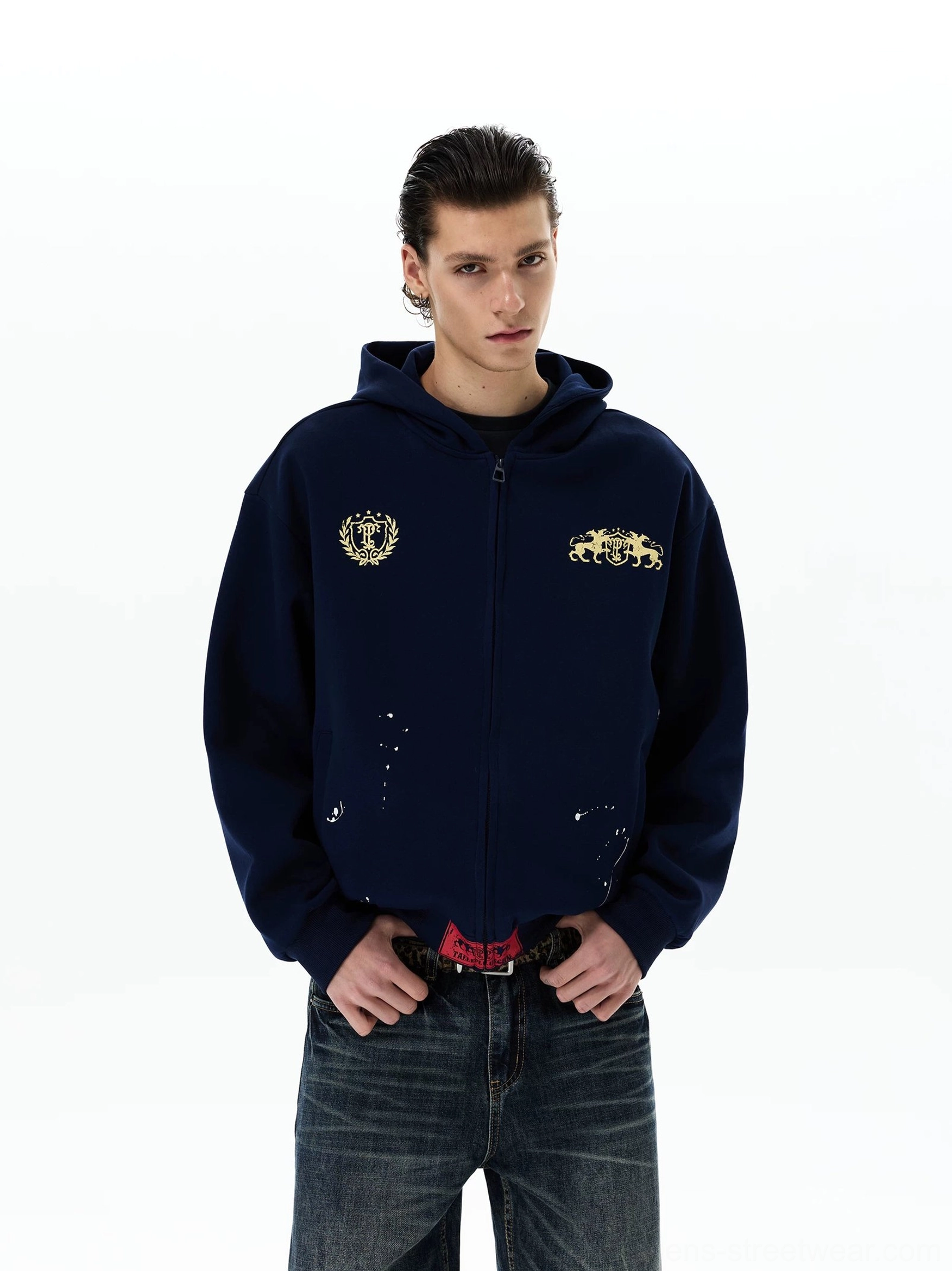 Navy heraldic horse crest oversized zip-up hoodie front half-body view with gold chest emblems