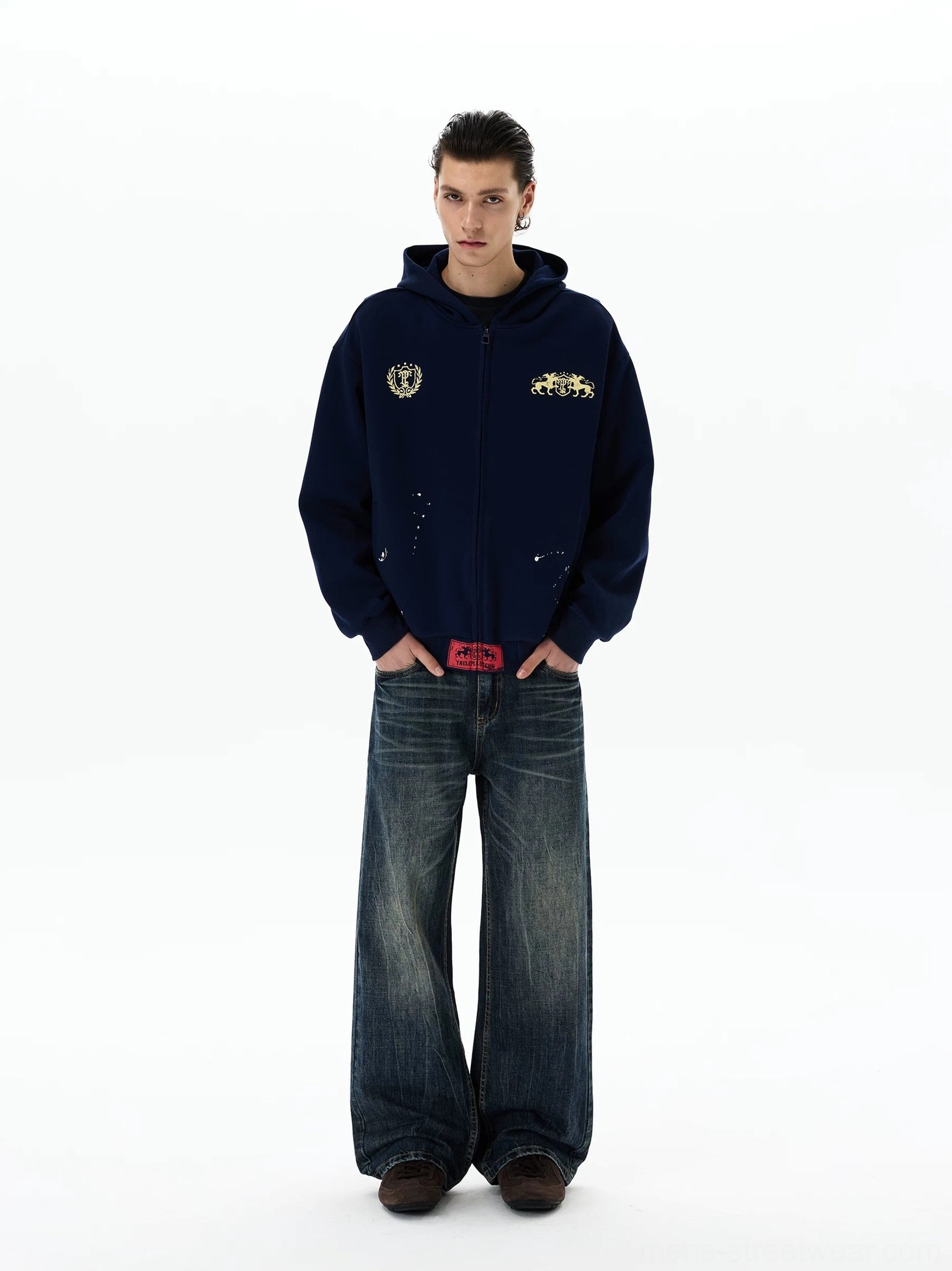 Navy oversized heraldic horse crest zip-up hoodie full front view styled with wide-leg jeans