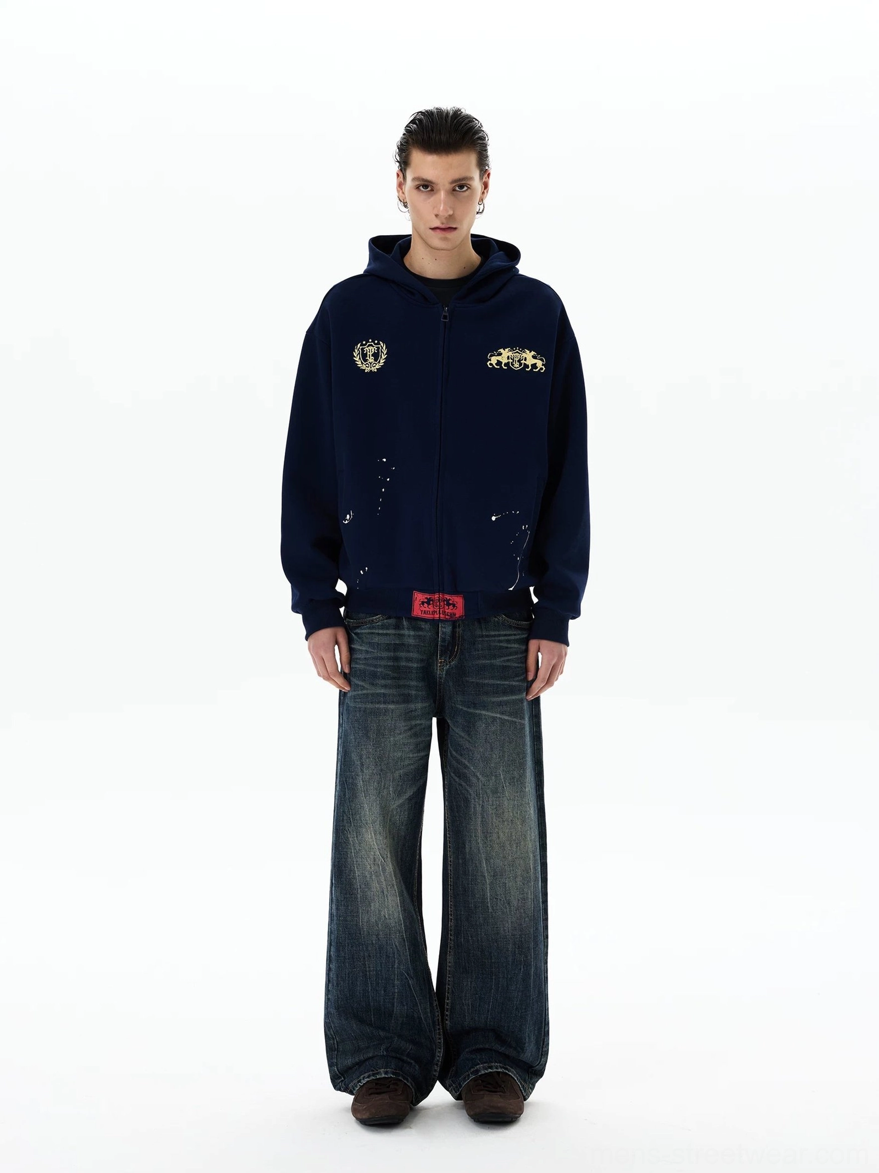 Navy full-zip hoodie with gold crest chest graphics and distressed paint splatter details