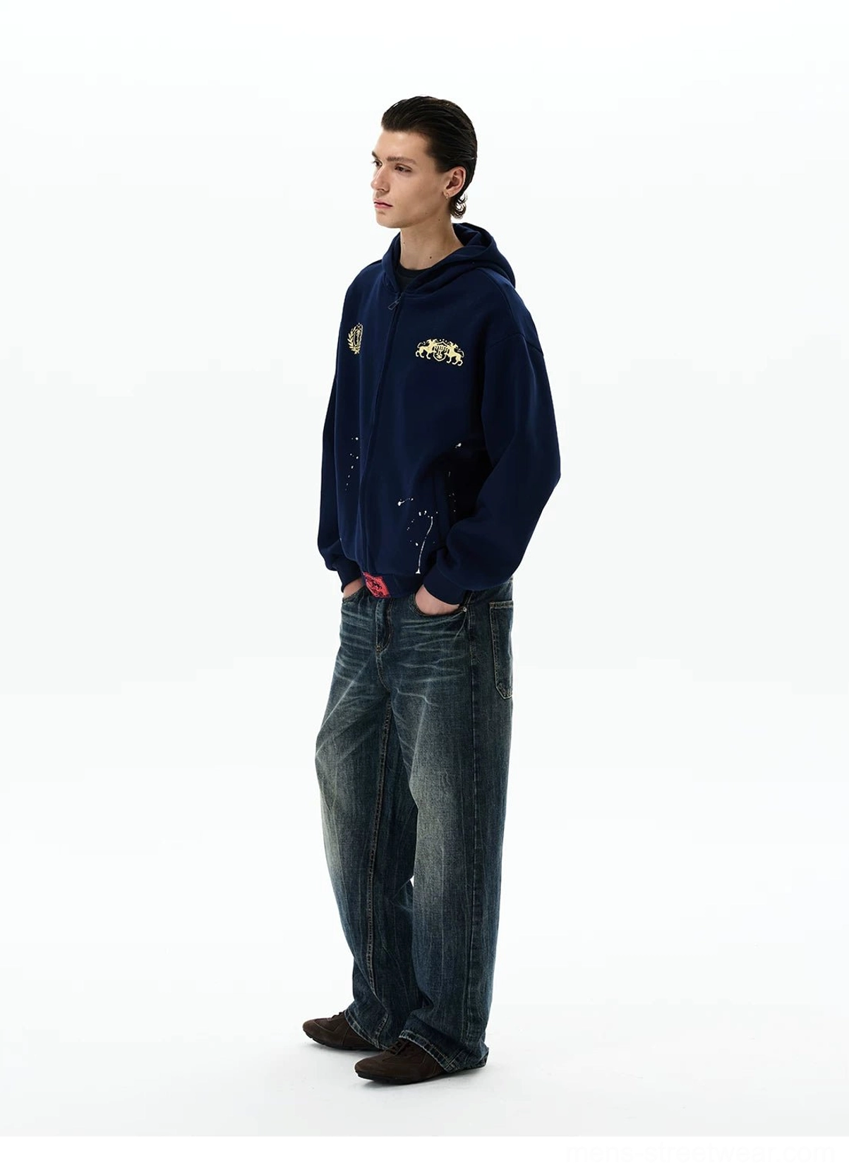 Navy full-zip oversized hoodie profile view featuring a clean hood and relaxed streetwear silhouette