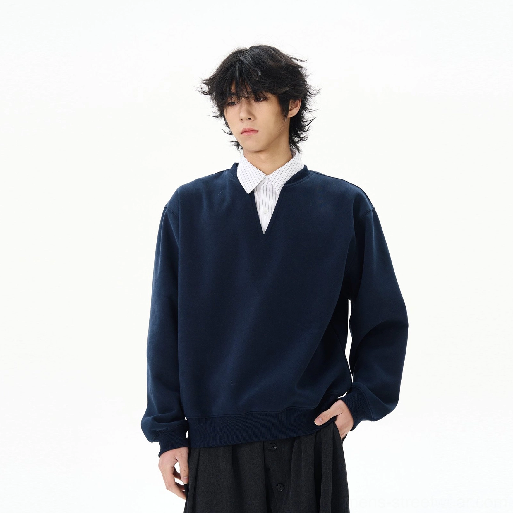Low-angle front view of navy notch-neck oversized sweatshirt with layered collared neckline and modern Korean streetwear proportions