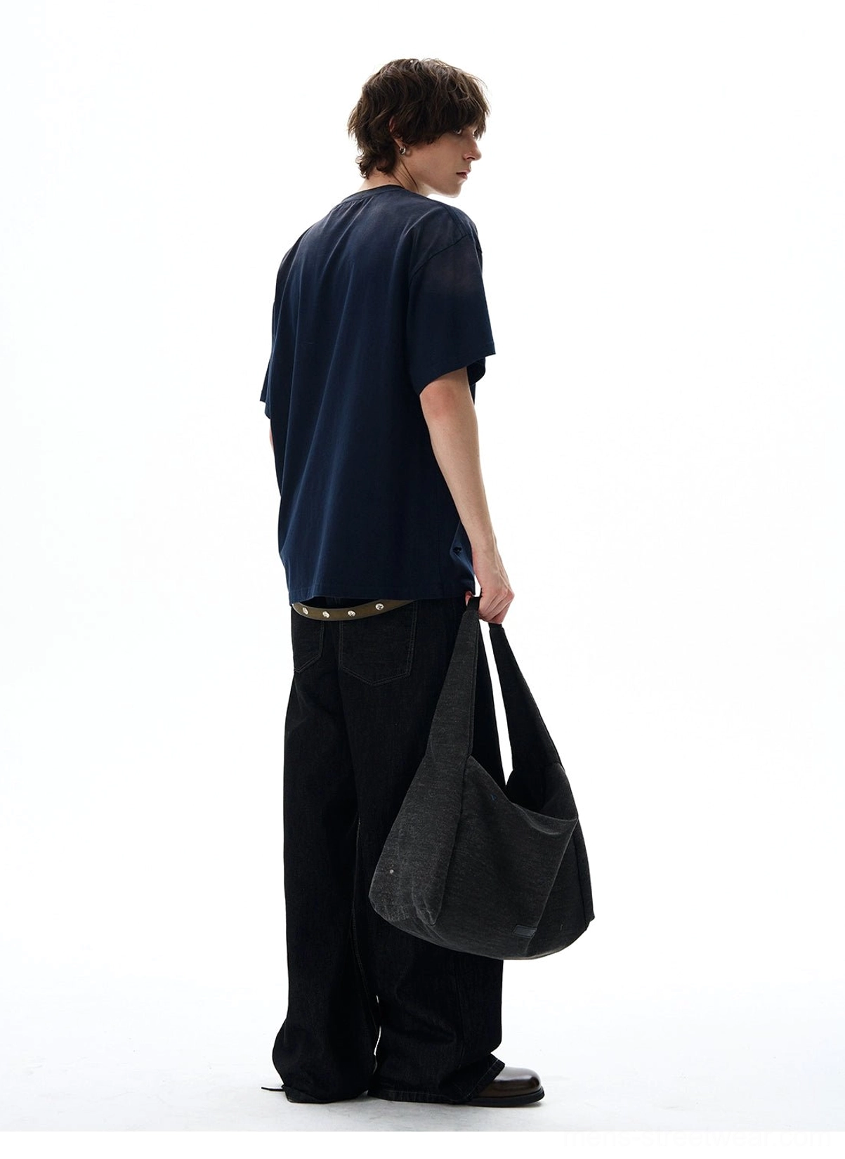 Back view of navy oversized crewneck T-shirt showing the clean solid-color back and relaxed streetwear fit