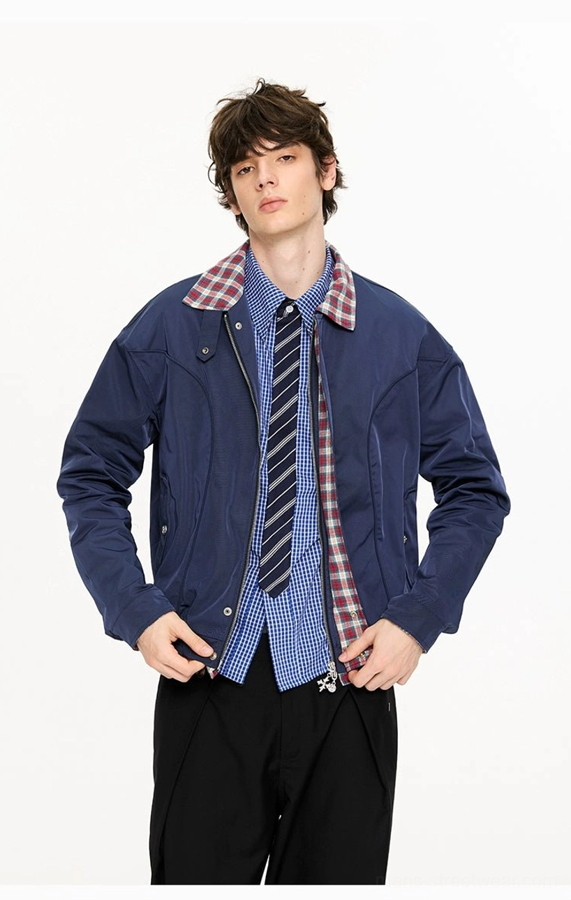 Navy plaid-lined Harrington jacket front view with snap placket flap pockets and visible contrast lining at inner hem