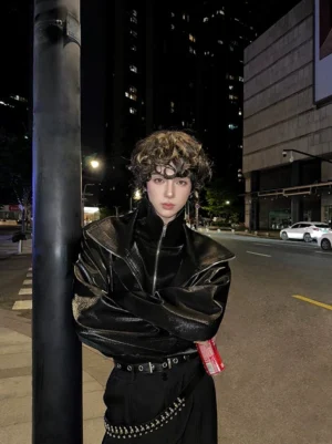 Black Nebula Gloss High Collar Cyberpunk Zip Jacket worn as a cropped glossy streetwear layer on a night city street