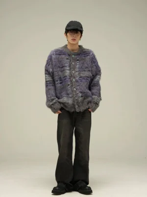 Front full-body view of an oversized purple gray fuzzy plaid cardigan styled with a black baseball cap and dark wide-leg jeans in a Korean streetwear outfit