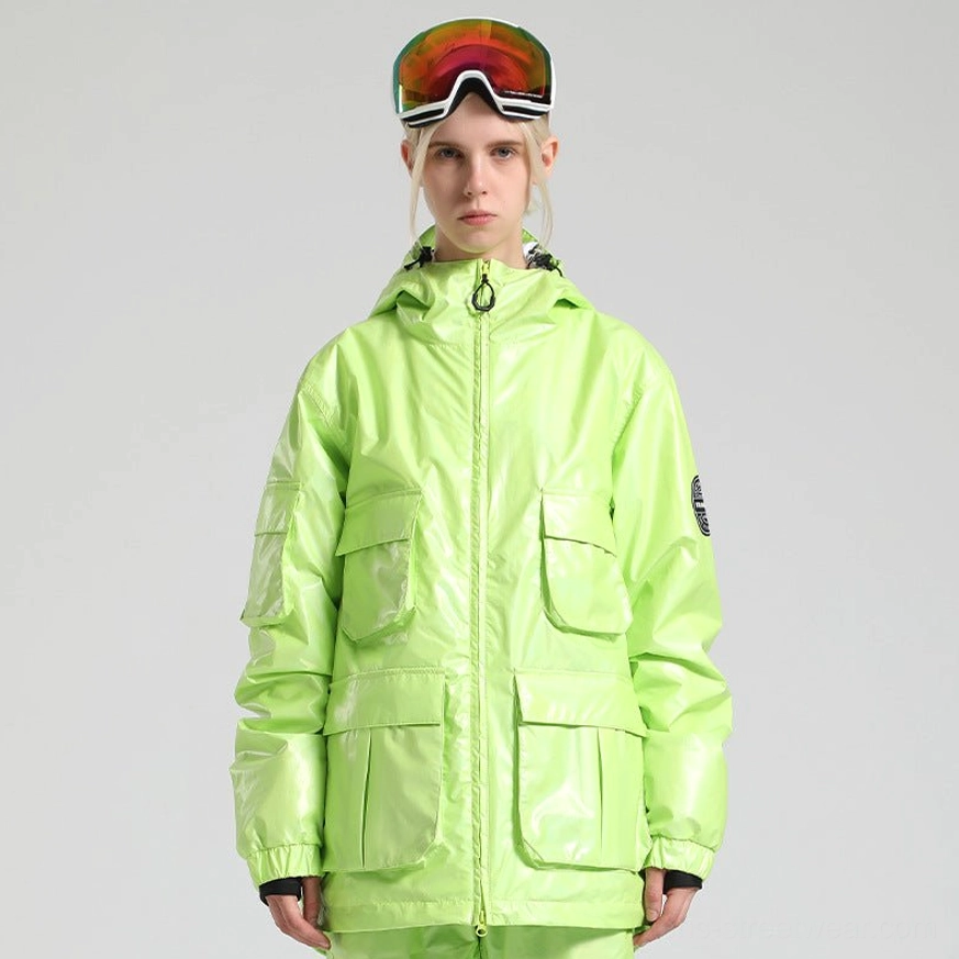 Neon lime green glossy storm shell ski jacket with attached hood, multiple patch pockets, ribbed cuffs, and bold gorpcore styling