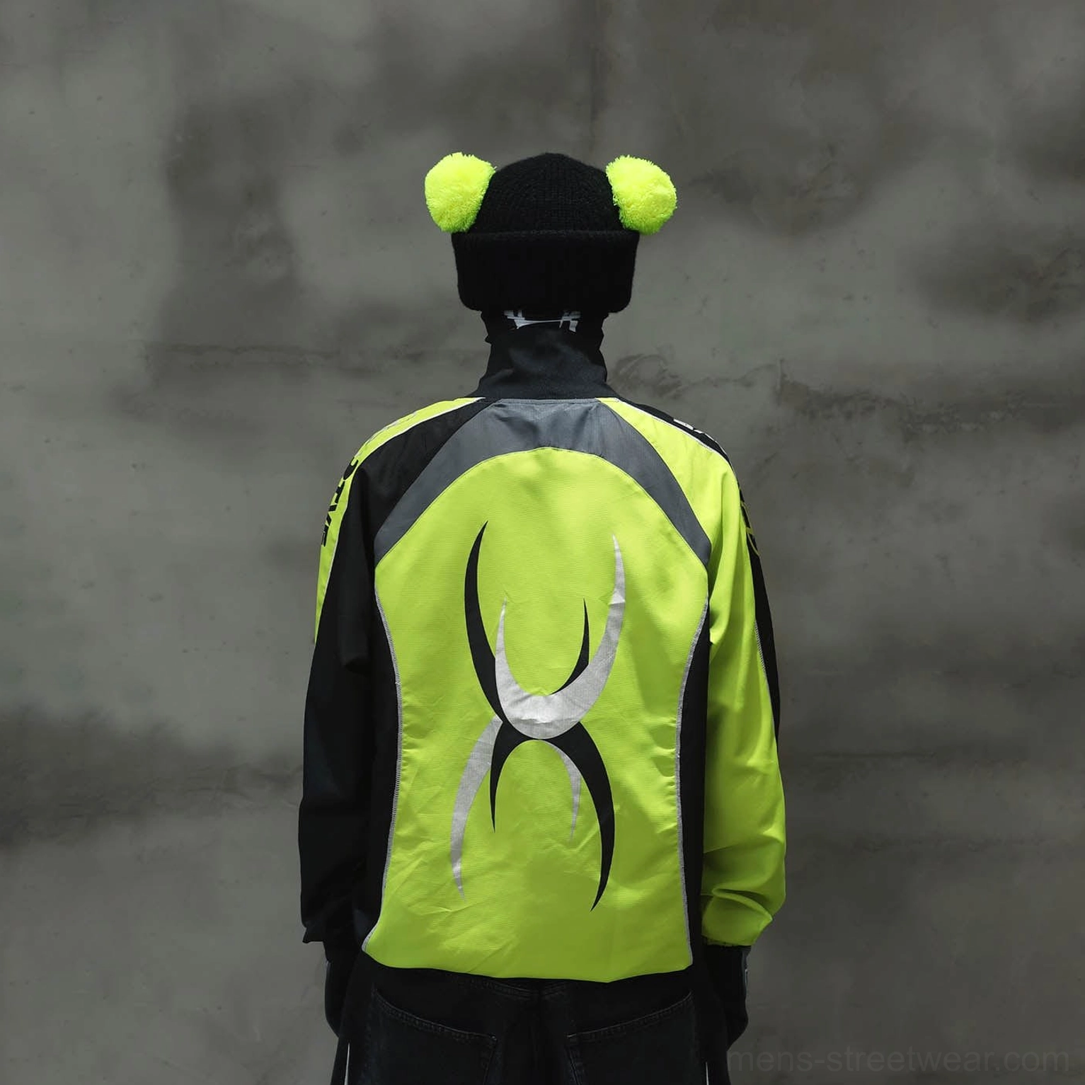 Rear view of neon lime green racing raglan jersey with silver graphic and black grey side panels