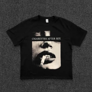 Black unisex graphic T-shirt with retro halftone smoking lips print and bold lettering, relaxed cropped boxy fit, short sleeves, and Korean-inspired streetwear styling