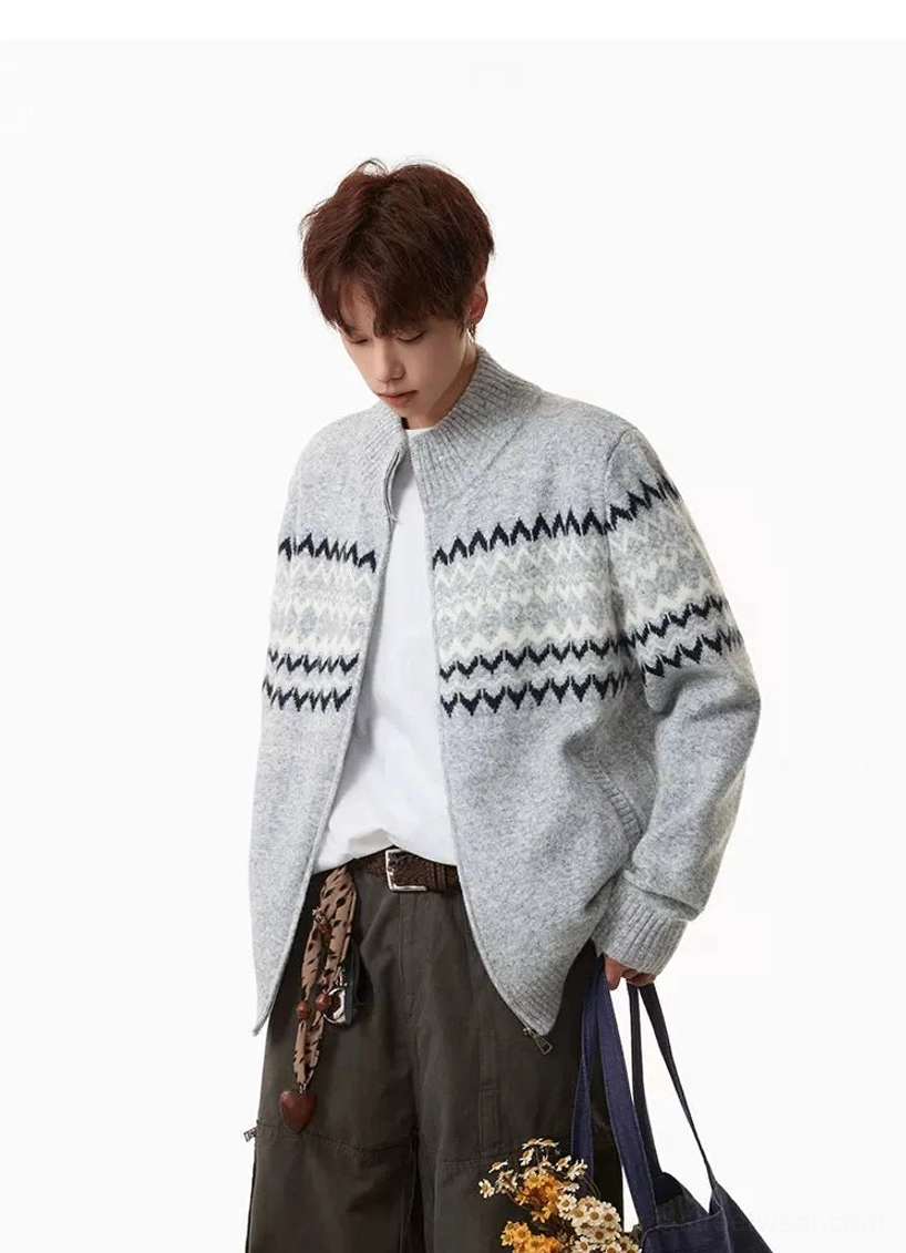 Rear three-quarter view of men's heather gray Fair Isle zip-up knit cardigan with continuous navy and cream pattern across upper back and sleeves
