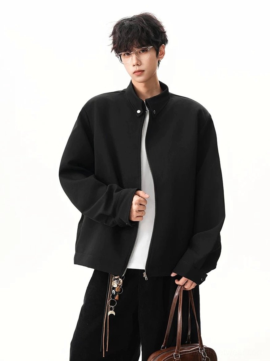 Close front view of obsidian black stand collar jacket with partially open zipper matte fabric and loose long sleeves