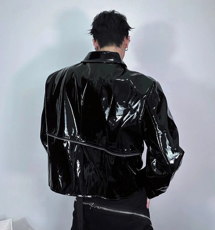 Back view of black high-gloss cropped streetwear jacket showing reflective PU finish and rear zipper detail