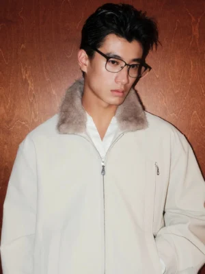 Close-up front portrait showing the off-white bomber jacket's grey faux-shearling collar, metal zipper, and layered white shirt