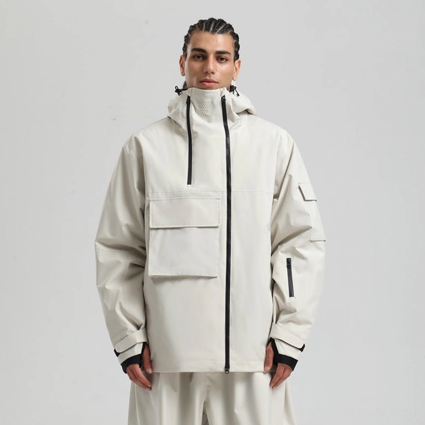 Off white colorblock techwear snowboard jacket variation with attached hood, cargo pockets, protective cuffs, and functional winter design