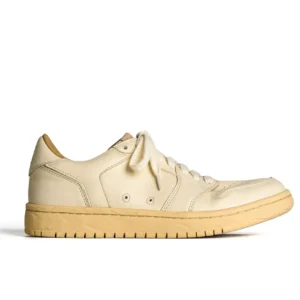 Solid off-white vintage cowhide leather court sneaker shown in side profile with classic low-top lace-up design