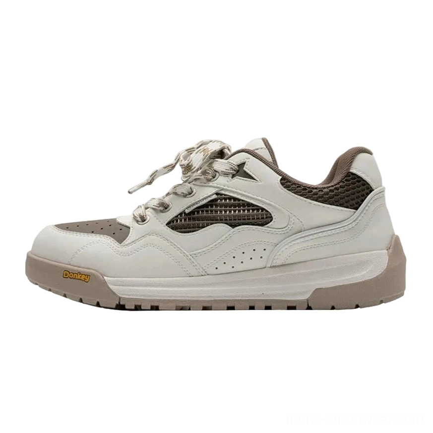 Off-white and dark brown retro runner sneakers with suede leather mesh panels and rugged rubber outsole