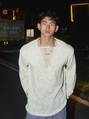 Off-white distressed lace-up V-neck knit shirt styled with light purple wide-leg pants in a Korean streetwear night scene