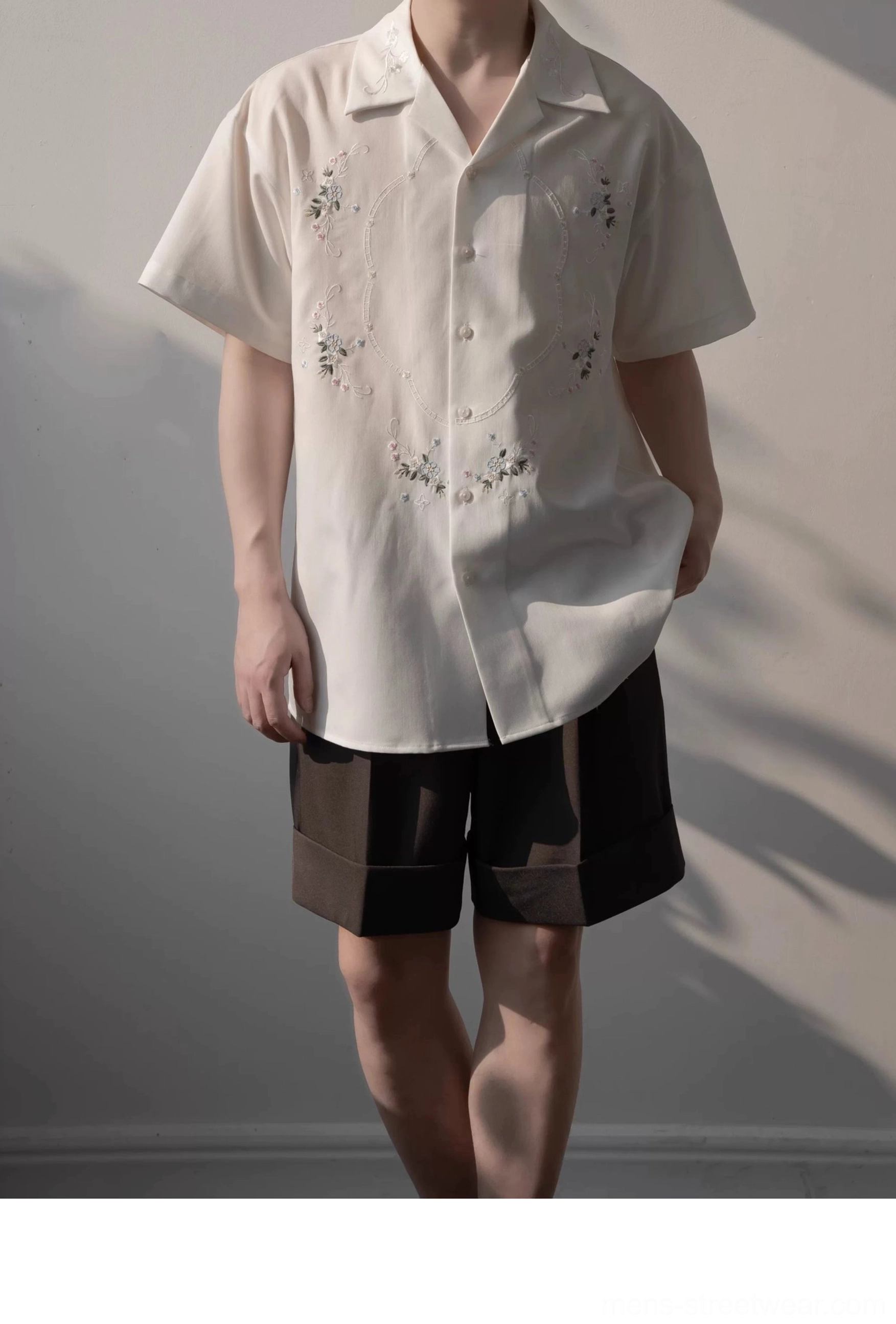 Off-white button front camp collar shirt with delicate floral embroidery styled in a relaxed Korean fashion outfit