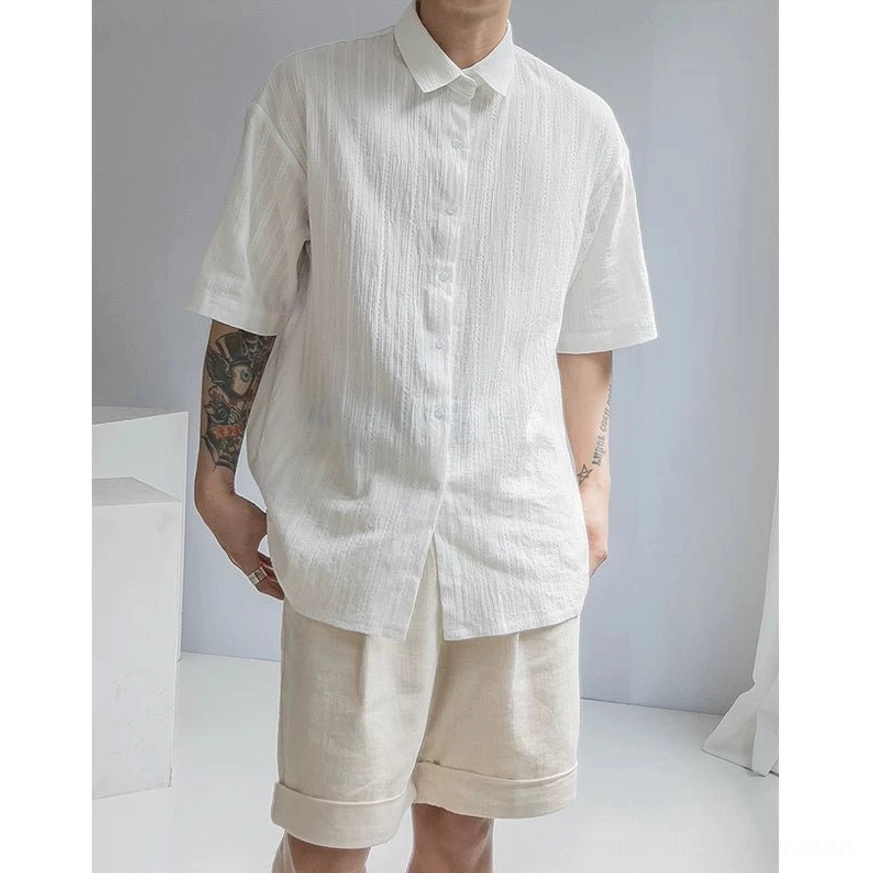 Off white men's textured stripe short sleeve shirt with pointed collar, dropped sleeves, and relaxed streetwear silhouette