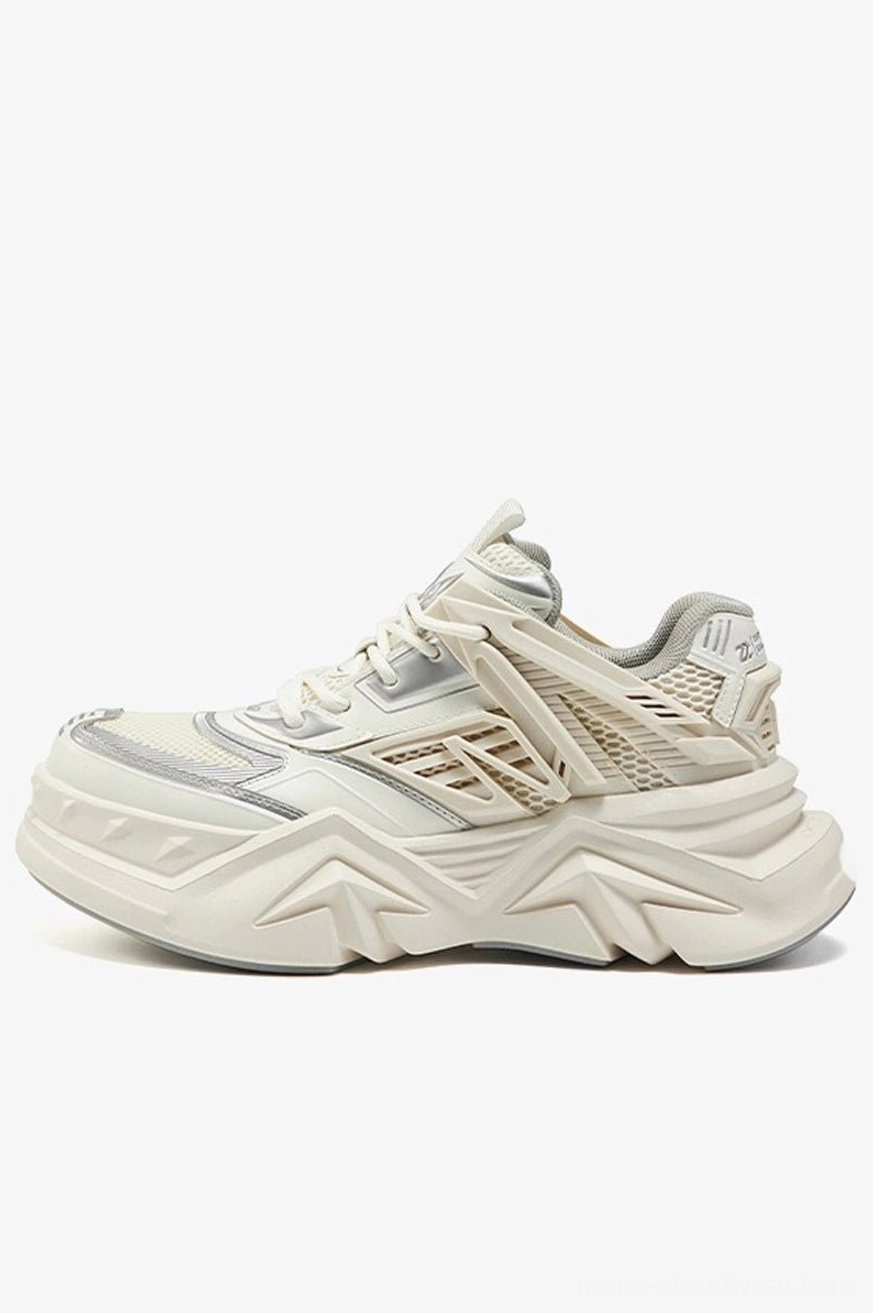 Off-white breathable chunky sneakers with metallic silver trim mesh panels and sculpted futuristic streetwear sole
