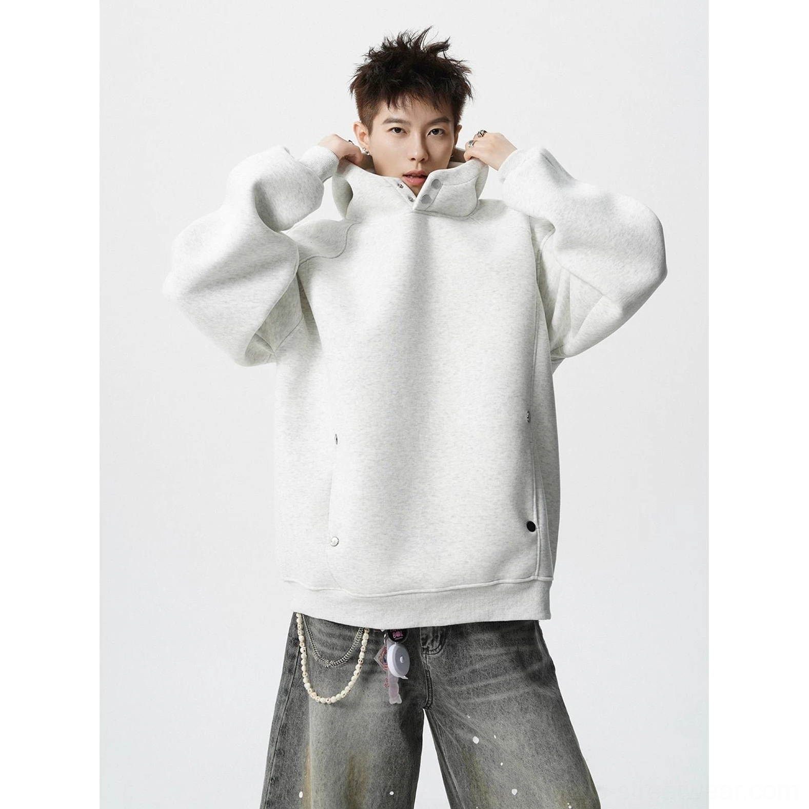 Off white oversized fleece hoodie with high snap collar and attached hood shown in a Korean streetwear outfit