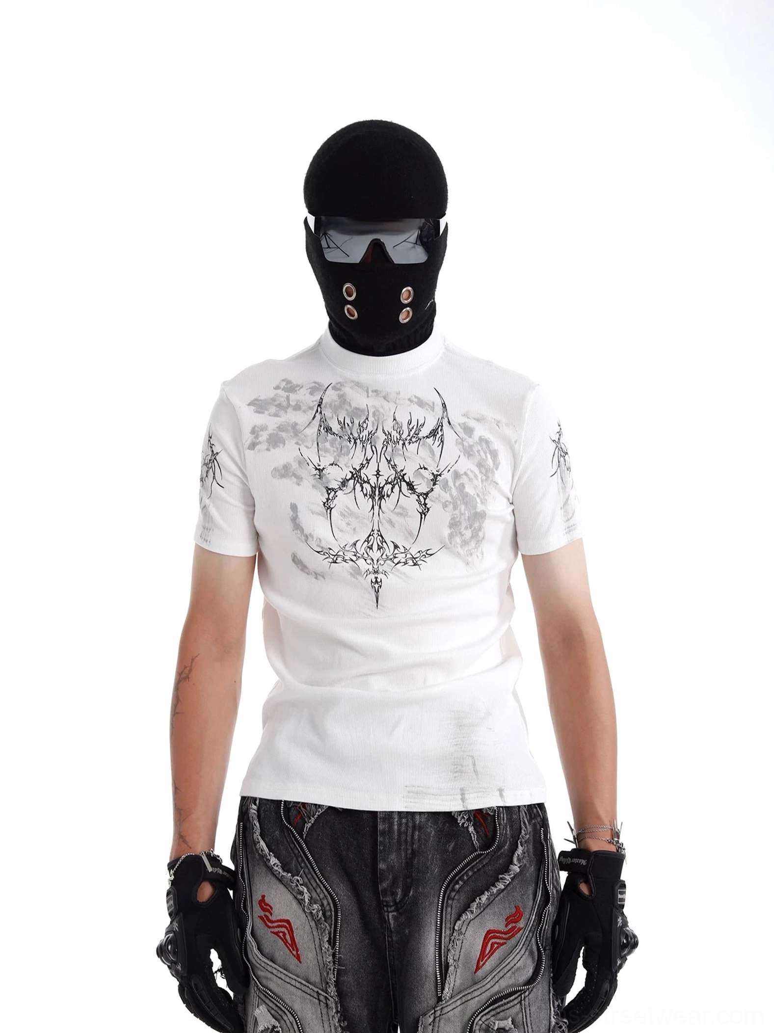 Off-white Phantom Sigil graphic T-shirt styled with black balaclava, leather gloves, and wide-leg jeans with red details
