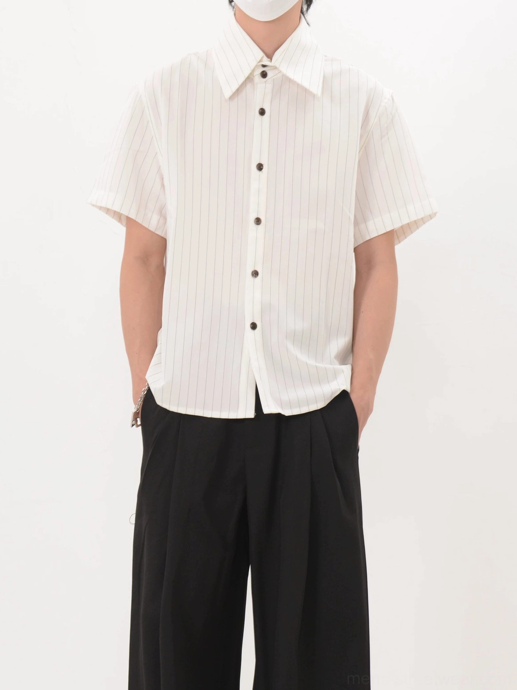Off white pinstripe short sleeve button up shirt shown front-on with dark brown buttons and modern Seoul style