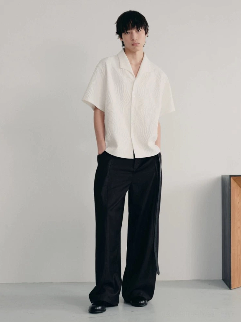 Off-white quilted short sleeve camp shirt styled with wide leg black trousers and leather shoes in modern Seoul streetwear fashion