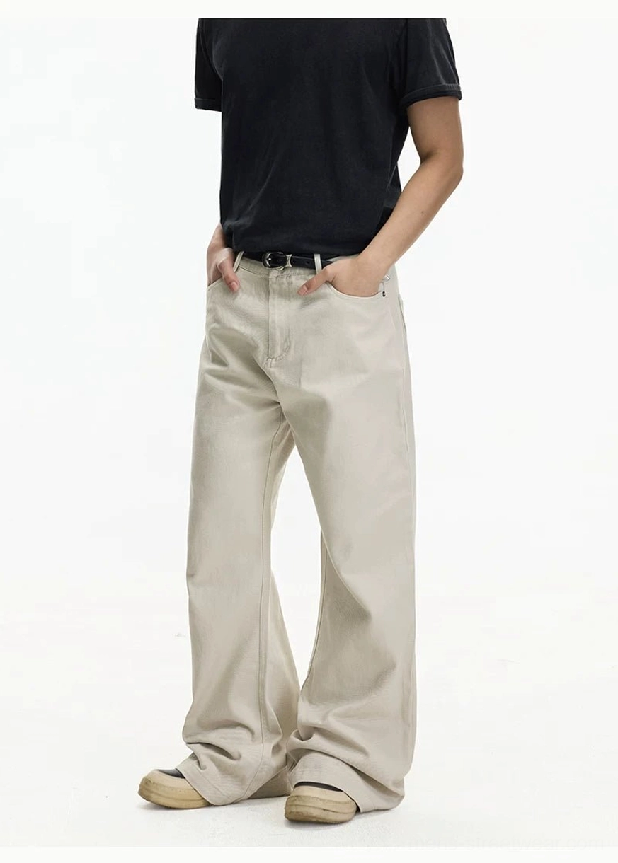 Off-white relaxed wide leg jeans right side profile with minimalist Korean streetwear styling