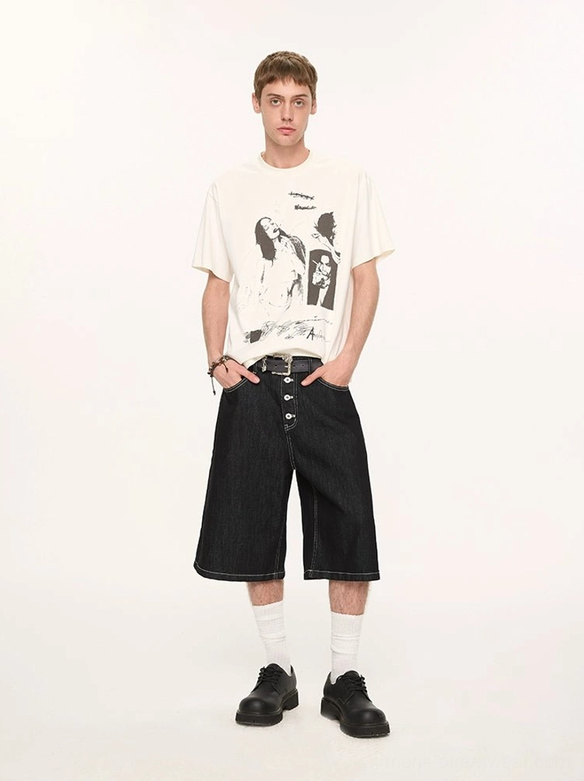 Off-white retro graphic print T-shirt styled with denim shorts white socks and black leather shoes for summer streetwear