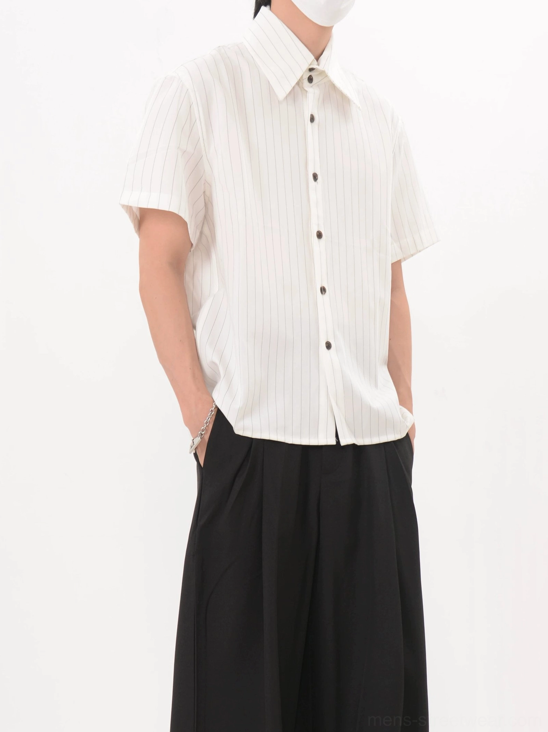 Off white vertical pinstripe short sleeve shirt shown from the left front angle with relaxed casual fit