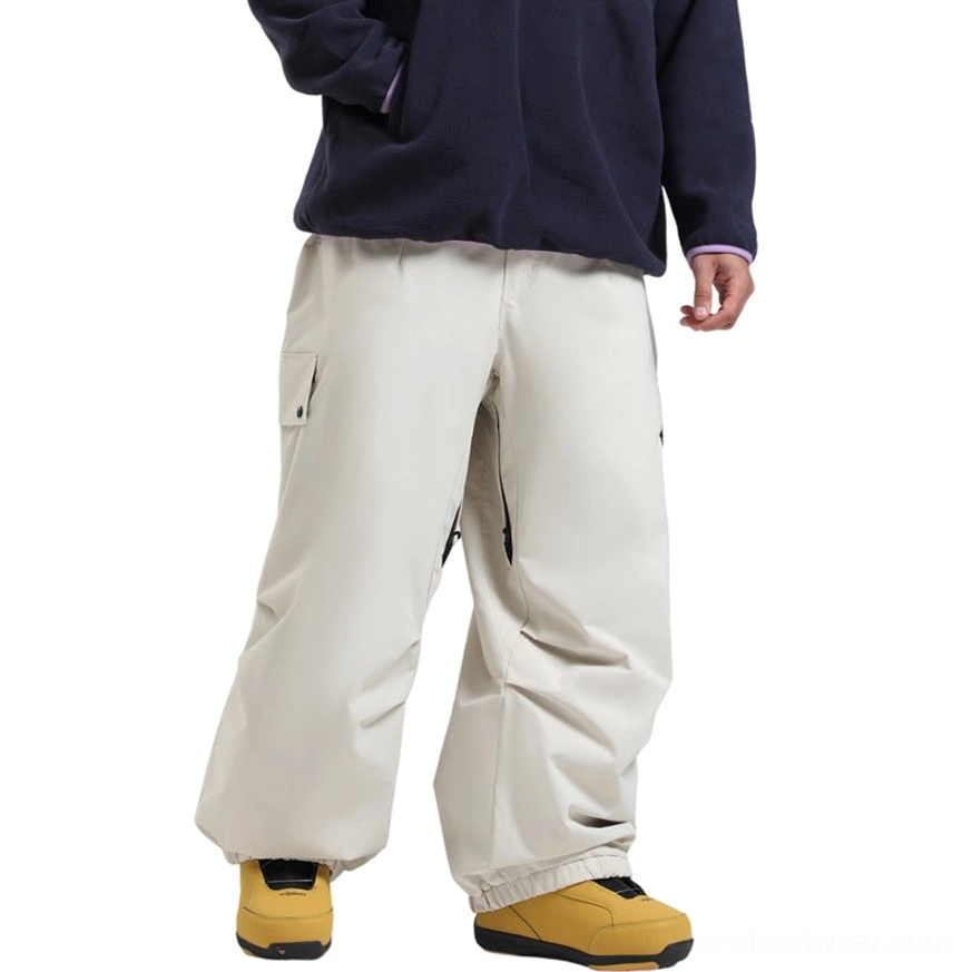 Off-white loose wide-leg cargo snow pants with thigh flap pocket, side zipper pockets, elasticated cuffs, and relaxed Korean streetwear snowboard styling