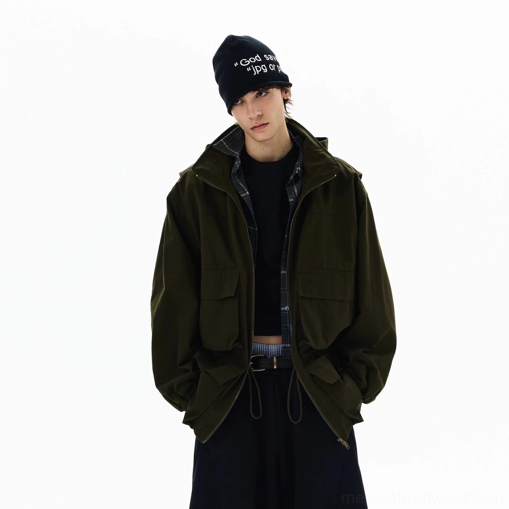 Olive green military-inspired streetwear parka product image with oversized proportions, matte woven fabric, utility pockets, and hooded design