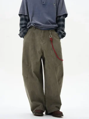 Front view of olive wide-leg cargo chain pants with red decorative chain, cargo pockets, and oversized Korean streetwear silhouette