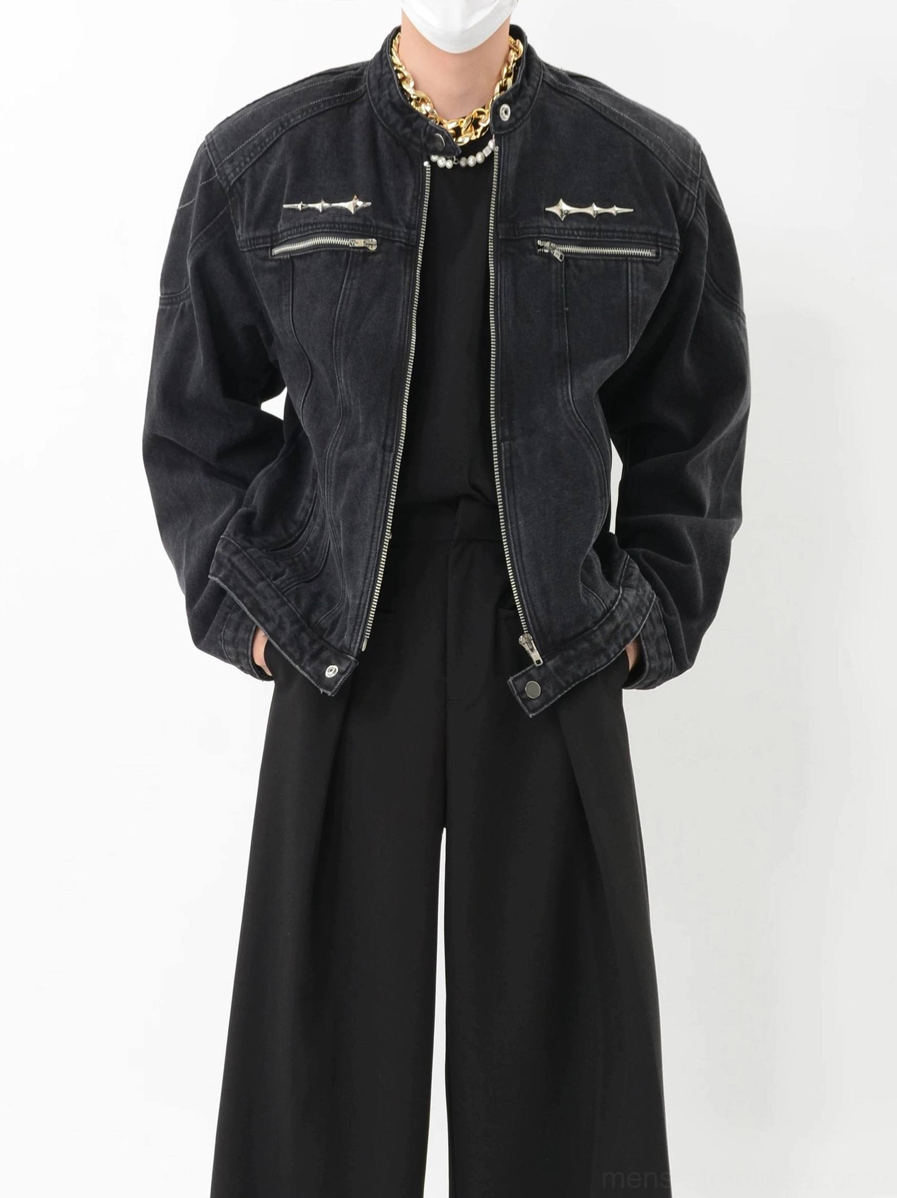 Open washed black denim biker jacket styled with layered necklaces wide leg trousers and contemporary Seoul streetwear outfit