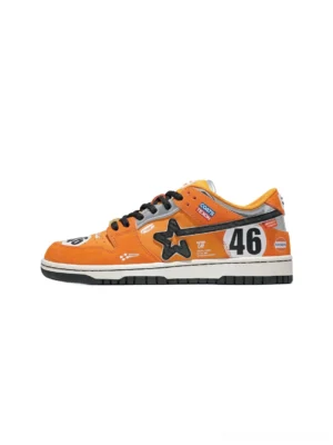 Orange 46 racing star panel skate sneakers shown from the right side with black laces, off-white midsole, black rubber outsole, and motorsport-inspired streetwear graphics