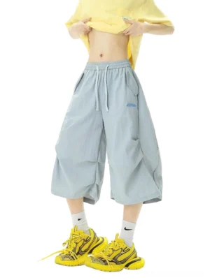 Front view of lightweight oversized balloon cropped jogger shorts with elastic drawstring waist and relaxed Korean streetwear silhouette