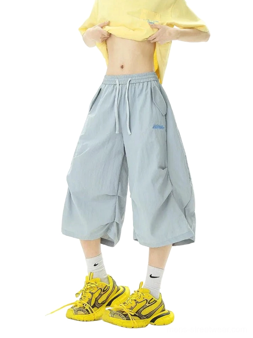 Front view of lightweight oversized balloon cropped jogger shorts with elastic drawstring waist and relaxed Korean streetwear silhouette